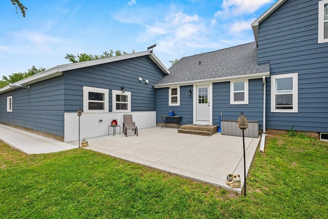N6965 Thede Rd, Black Creek, WI 54106 - back of property with a yard, a patio, and a shingled roof