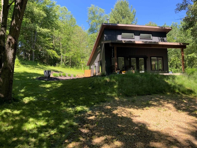 N4857 Oak Valley Ln, Elroy, WI 53929 - back of property featuring a lawn