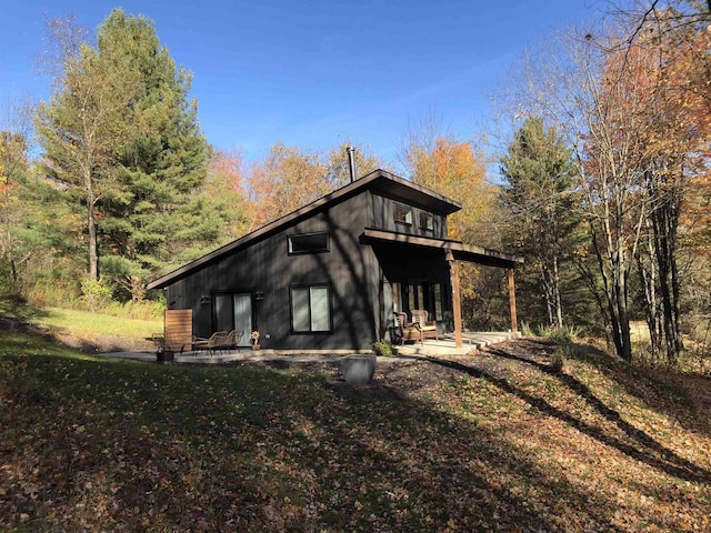 N4857 Oak Valley Ln, Elroy, WI 53929 - back of house featuring a patio