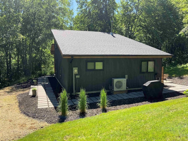 N4857 Oak Valley Ln, Elroy, WI 53929 - view of property exterior featuring roof with shingles and a yard