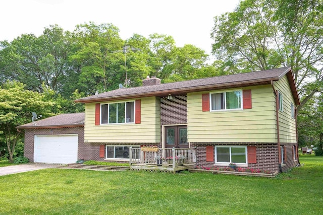 2743 Bluebird Ln, Cottage Grove, WI 53527 - raised ranch featuring an attached garage, concrete driveway, a chimney, brick siding, and a front yard