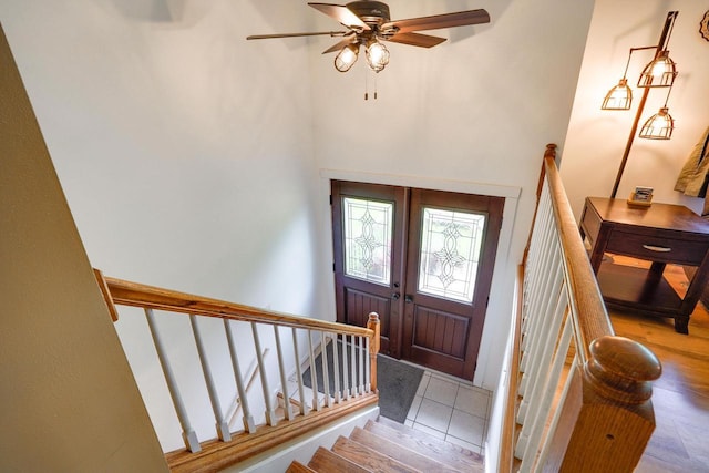 2743 Bluebird Ln, Cottage Grove, WI 53527 - foyer entrance featuring ceiling fan, a towering ceiling, and stairway