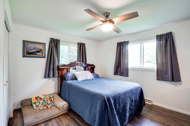 2743 Bluebird Ln, Cottage Grove, WI 53527 - bedroom with dark wood-style floors and a ceiling fan