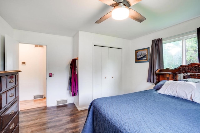 2743 Bluebird Ln, Cottage Grove, WI 53527 - bedroom featuring dark wood-style flooring, a closet, and ceiling fan