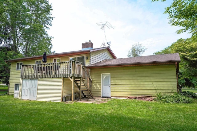 2743 Bluebird Ln, Cottage Grove, WI 53527 - back of house featuring stairway, a chimney, a yard, and a wooden deck