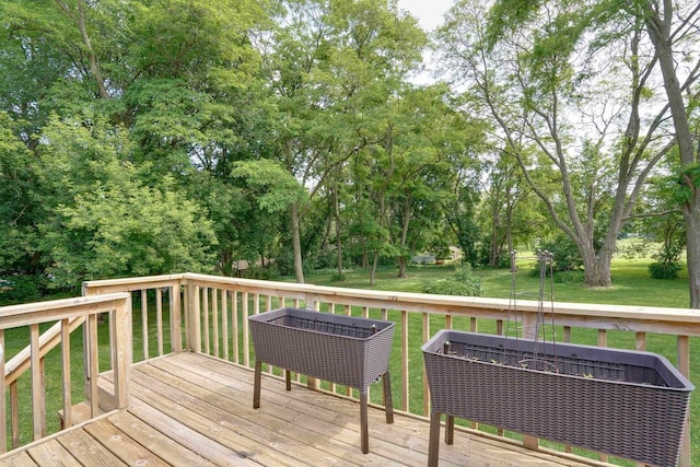 2743 Bluebird Ln, Cottage Grove, WI 53527 - deck featuring a lawn and view of wooded area