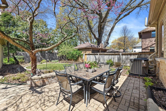 4765 N Woodburn St, Whitefish Bay, WI 53211 - fenced backyard featuring outdoor dining area and a patio area
