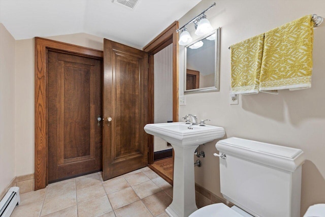 4765 N Woodburn St, Whitefish Bay, WI 53211 - bathroom with baseboard heating, tile patterned flooring, and lofted ceiling
