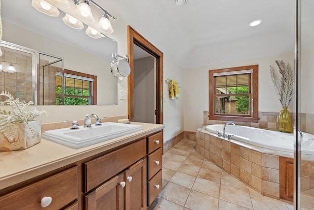 4765 N Woodburn St, Whitefish Bay, WI 53211 - bathroom with vanity, a garden tub, tile patterned floors, and a tile shower