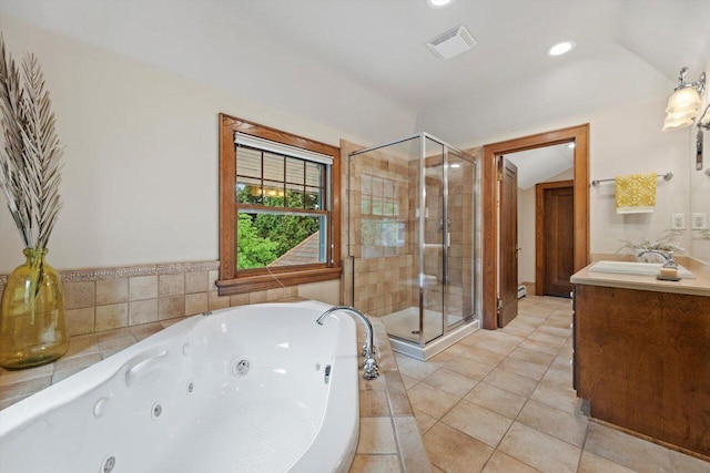 4765 N Woodburn St, Whitefish Bay, WI 53211 - full bath featuring vanity, a stall shower, a whirlpool tub, tile patterned flooring, and recessed lighting