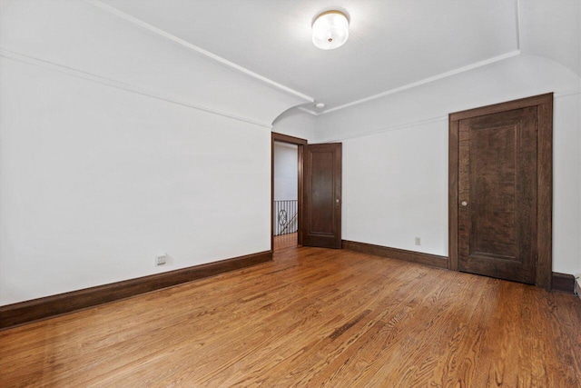 4765 N Woodburn St, Whitefish Bay, WI 53211 - empty room with wood finished floors and baseboards