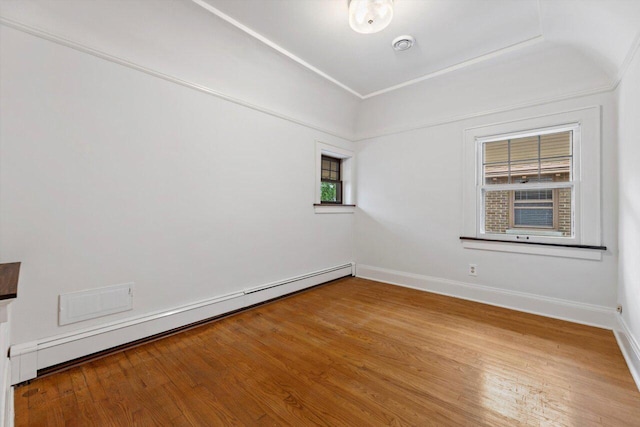 4765 N Woodburn St, Whitefish Bay, WI 53211 - empty room with baseboard heating and wood finished floors