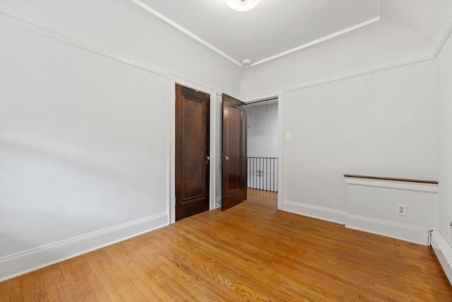 4765 N Woodburn St, Whitefish Bay, WI 53211 - unfurnished room featuring wood finished floors and baseboards