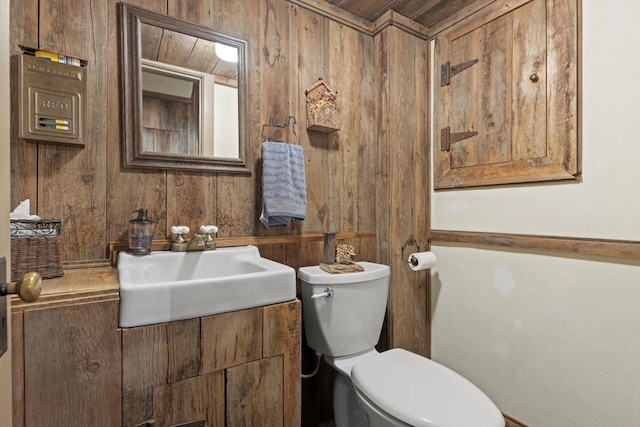 4765 N Woodburn St, Whitefish Bay, WI 53211 - bathroom featuring vanity and wooden walls