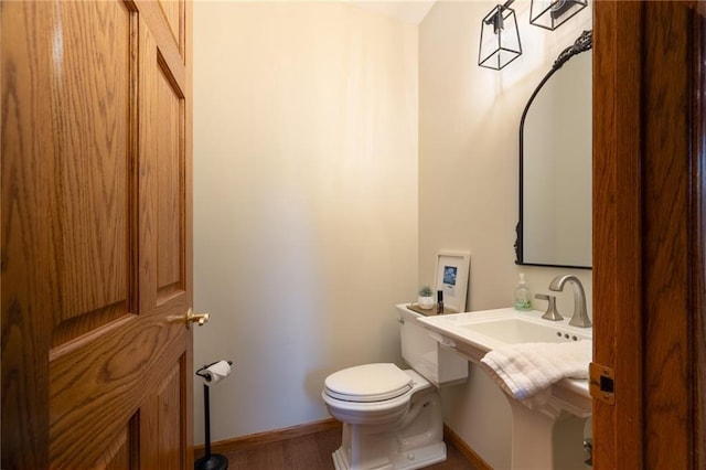 2193 County Road C, New Richmond, WI 54017 - bathroom with toilet and wood finished floors