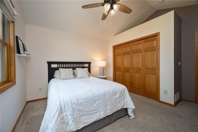 2193 County Road C, New Richmond, WI 54017 - bedroom with carpet floors, vaulted ceiling, a closet, and a ceiling fan
