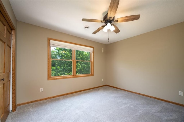 2193 County Road C, New Richmond, WI 54017 - unfurnished bedroom with light colored carpet, a closet, and a ceiling fan