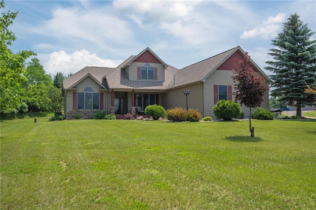 2193 County Road C, New Richmond, WI 54017 - craftsman house featuring a front lawn and a shingled roof