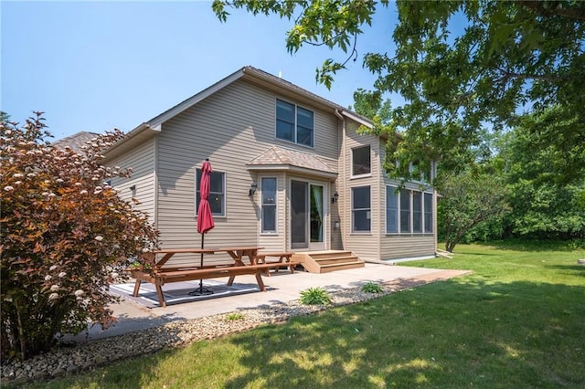 2193 County Road C, New Richmond, WI 54017 - rear view of house with a patio, a yard, and a sunroom