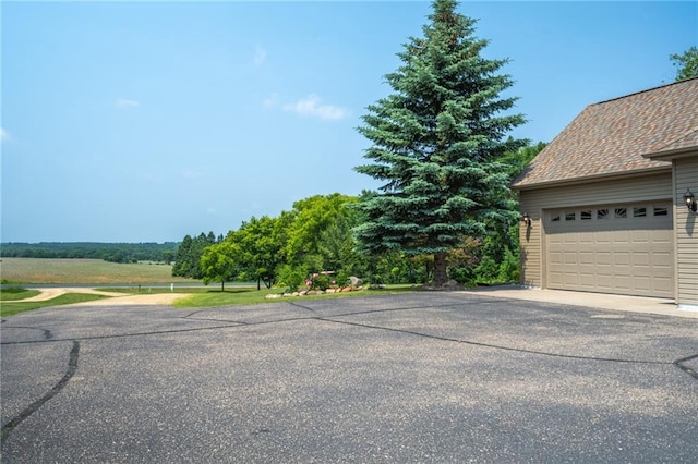 2193 County Road C, New Richmond, WI 54017 - garage featuring asphalt driveway