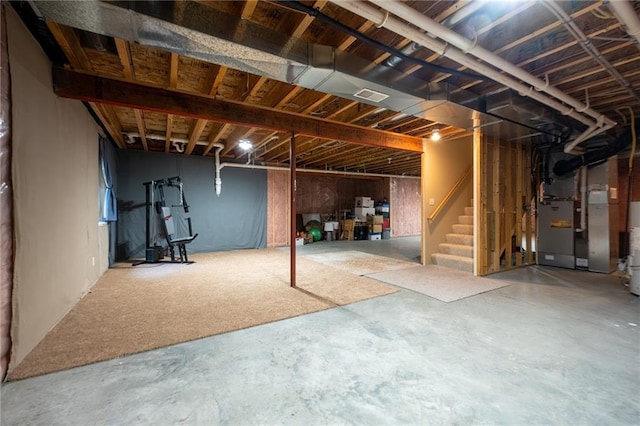 2193 County Road C, New Richmond, WI 54017 - unfinished basement featuring stairs and heating unit