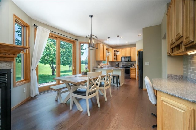 2193 County Road C, New Richmond, WI 54017 - dining room with wood finished floors, recessed lighting, and a high end fireplace