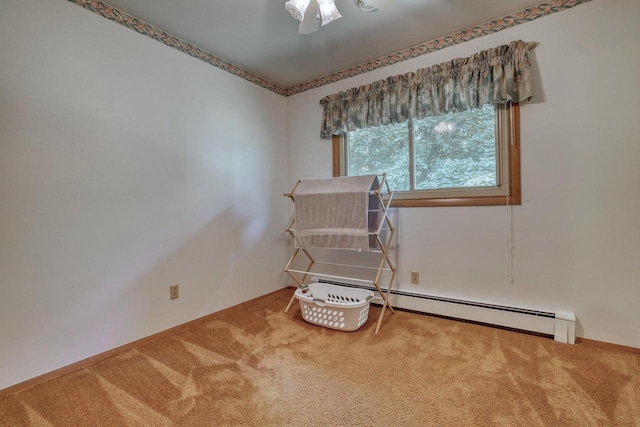 627 W Wisconsin St, Palmyra, WI 53156 - living area featuring baseboard heating and carpet flooring
