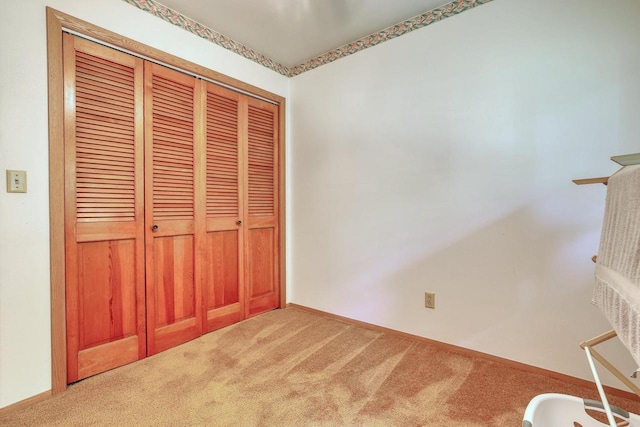 627 W Wisconsin St, Palmyra, WI 53156 - unfurnished bedroom featuring carpet and a closet