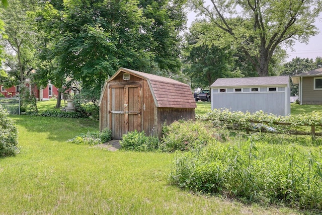 627 W Wisconsin St, Palmyra, WI 53156 - view of grassy yard featuring a shed