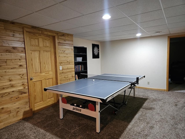 200890 Robin Rd, Marshfield, WI 54449 - recreation room with dark colored carpet, wooden walls, a paneled ceiling, recessed lighting, and built in shelves