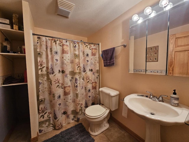 200890 Robin Rd, Marshfield, WI 54449 - bathroom with tile patterned floors, a textured ceiling, and curtained shower