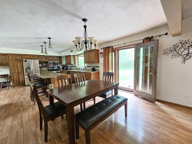 200890 Robin Rd, Marshfield, WI 54449 - dining room with a chandelier and light wood-style floors