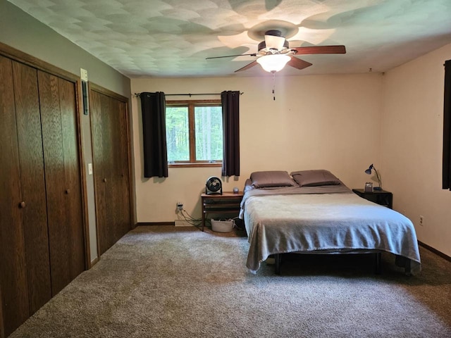 200890 Robin Rd, Marshfield, WI 54449 - bedroom featuring carpet, multiple closets, and ceiling fan