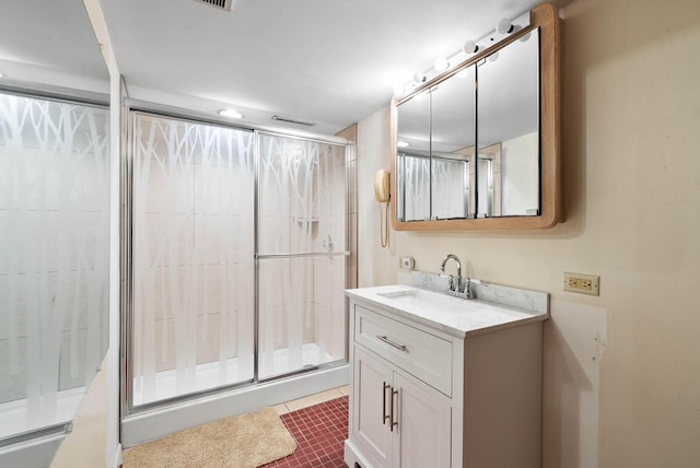 N1808 Woodland Rd, Lake Geneva, WI 53147 - full bathroom with a tile shower, vanity, and tile patterned floors