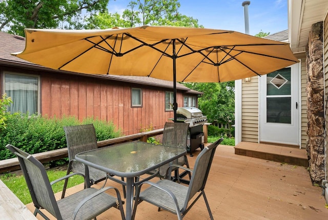 N1808 Woodland Rd, Lake Geneva, WI 53147 - view of patio / terrace with outdoor dining area, a wooden deck, and grilling area