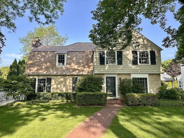 6123 N Berkeley Blvd, Whitefish Bay, WI 53217 - view of front of house featuring a chimney