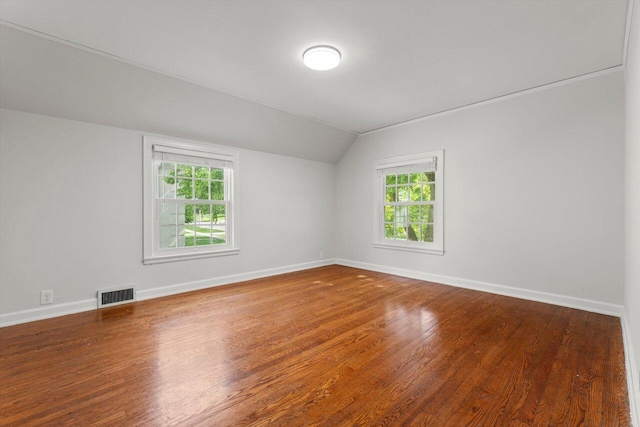 6123 N Berkeley Blvd, Whitefish Bay, WI 53217 - empty room featuring lofted ceiling and wood finished floors