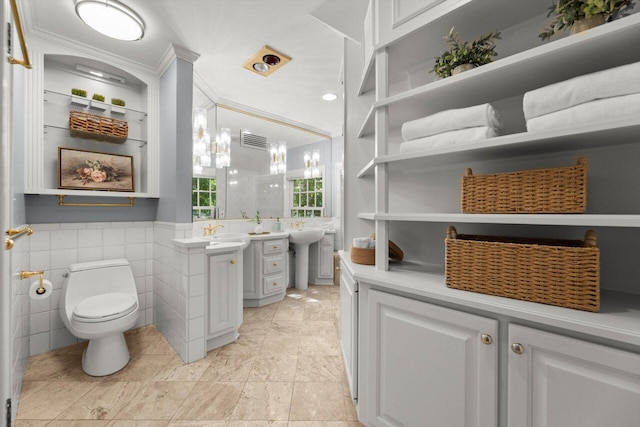 6123 N Berkeley Blvd, Whitefish Bay, WI 53217 - bathroom with tile walls, vanity, and crown molding