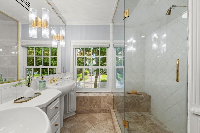 6123 N Berkeley Blvd, Whitefish Bay, WI 53217 - bathroom with a shower stall, two vanities, and crown molding