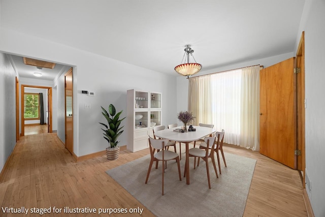 452 Woodland Dr, Wisconsin Rapids, WI 54494 - dining space with light wood-style floors
