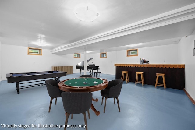452 Woodland Dr, Wisconsin Rapids, WI 54494 - rec room featuring concrete floors and a bar