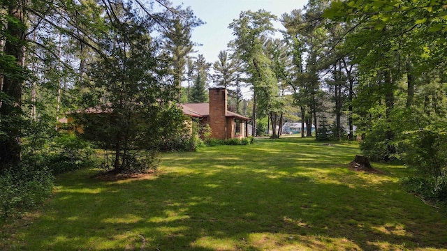 452 Woodland Dr, Wisconsin Rapids, WI 54494 - view of grassy yard