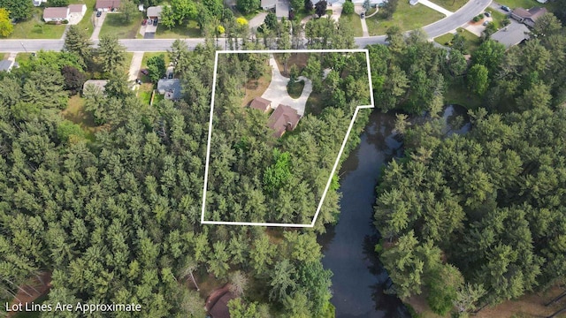 452 Woodland Dr, Wisconsin Rapids, WI 54494 - aerial view of property's location with property boundaries highlighted and a nearby body of water