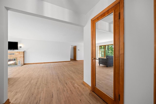 452 Woodland Dr, Wisconsin Rapids, WI 54494 - hall with light wood-style floors and baseboards