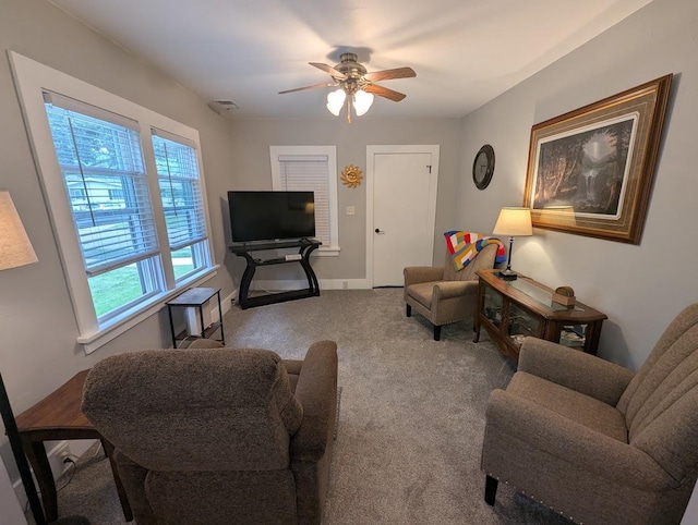 219 Guenther St, Oshkosh, WI 54902 - living area featuring carpet and ceiling fan