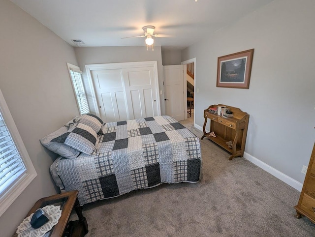 219 Guenther St, Oshkosh, WI 54902 - carpeted bedroom with a closet and a ceiling fan