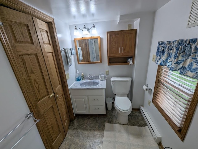 219 Guenther St, Oshkosh, WI 54902 - half bath with baseboard heating and vanity
