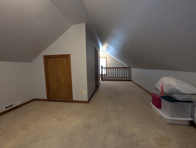 219 Guenther St, Oshkosh, WI 54902 - additional living space featuring lofted ceiling and light colored carpet