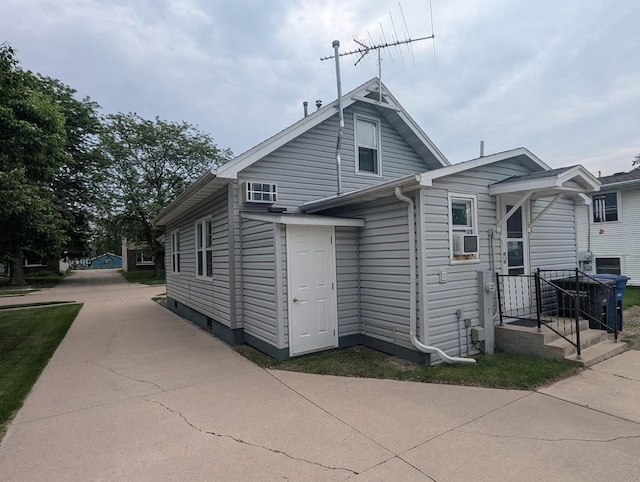 219 Guenther St, Oshkosh, WI 54902 - rear view of property featuring driveway