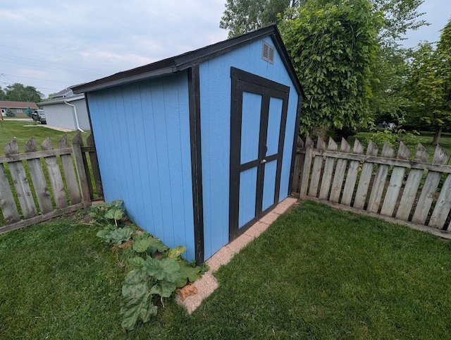 219 Guenther St, Oshkosh, WI 54902 - view of shed featuring a fenced backyard